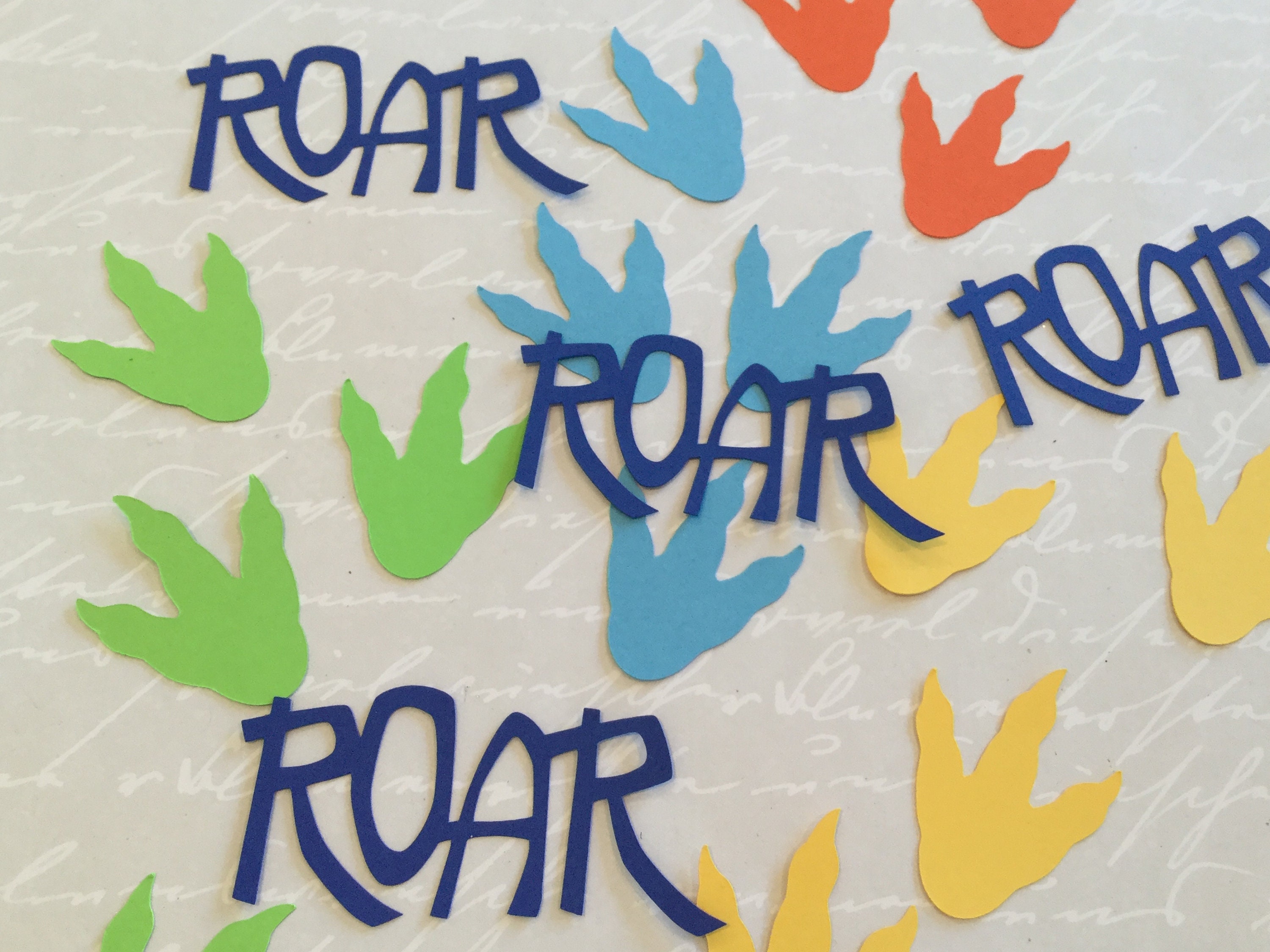Dinosaur paper confetti 100 pieces dinosaur theme birthday decoration dinosaur tracks dinosaur footprint die cut roar word
