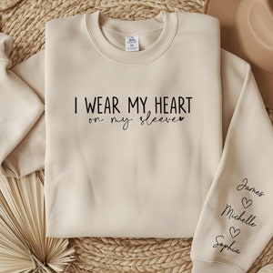 Personalized Mom Sweatshirt With Kids Names, I Wear My Heart On My Sleeve Sweatshirt, Mother’s Day Gift, Mom Sweatshirt, Grandma Heart Gift