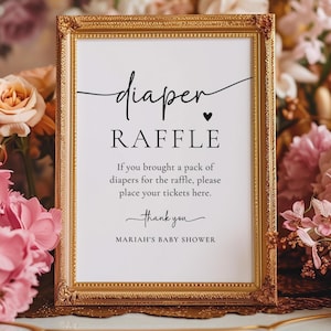 Może przedstawiać: Złota rama z napisem "diaper RAFFLE" czarnym skryptem. Znak zawiera tekst "If you brought a pack of diapers for the raffle, please place your tickets here. thank you MARIAH'S BABY SHOWER." Tło jest kwiatowe.
