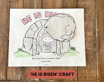 May include: A printable craft for kids featuring a tomb with a large stone rolling away, an angel standing in the doorway, and the text "HE IS RISEN!"  The text "He is not here; he has risen! Luke 24:6" is also included.
