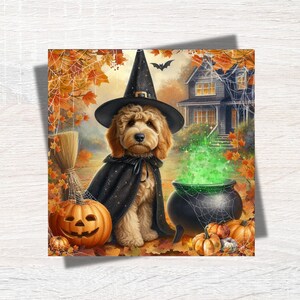 May include: A golden-coloured dog wearing a black witch hat and cape, positioned next to a carved jack-o'-lantern, a broom, and a black cauldron emitting green smoke, set against a backdrop of autumn leaves, spiderwebs, and a house.