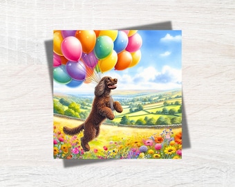 May include: A brown dog with a long tail is holding onto a bunch of colorful balloons. The dog is standing in a field of flowers. The balloons are red, orange, yellow, green, blue, purple, and pink.