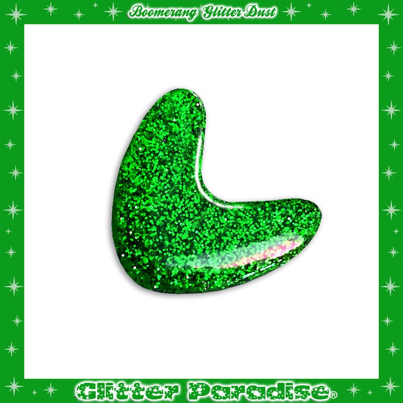May include: Green glitter boomerang shape. The glitter is a fine, sparkly green.