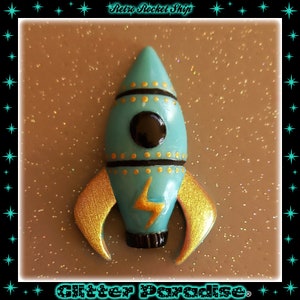 Retro raketschip - broche - retro futurisme - ruimteschip raket - alien - atoomraket uit de jaren 50 - sieraden retro atomic 50 - Glitter Paradise®