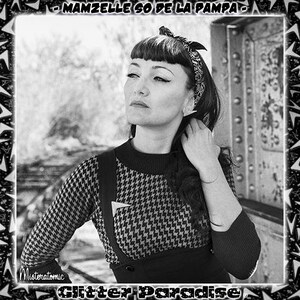 May include: Black and white photo of a woman with dark hair and a headband. She is wearing a black and white patterned sweater with a black skirt. The text "MAMMZELLE SO DE LA PAMPA" is at the top of the image.