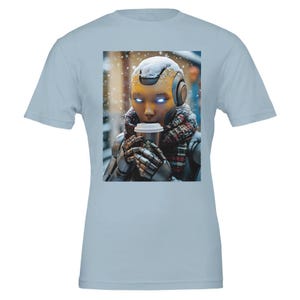 May include: A robot with a yellow face and blue eyes is wearing a scarf and holding a cup of coffee. The robot is standing in a snowy environment.