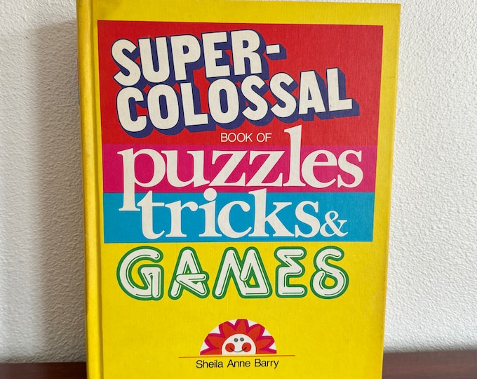 Super-Colossal Book of puzzles tricks & Games by Sheila Anne Barry copyright 1978