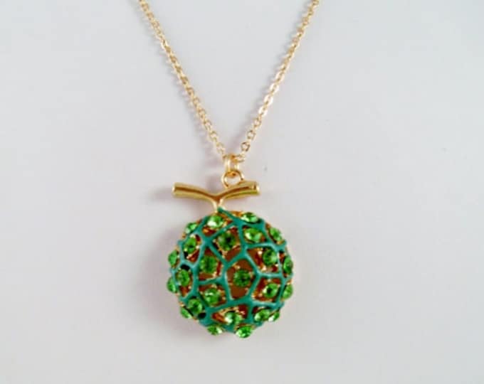 Elegant Goldtone And Green Crystals Melon Pendant Necklace