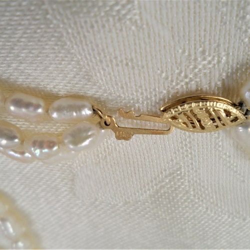 Vintage shops Multi Strand 14K Rice Pearl Necklace