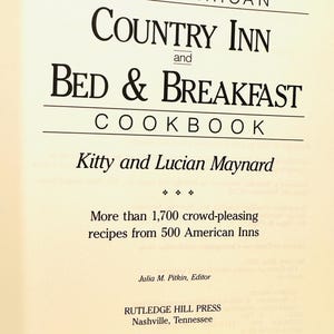 May include: The American Country Inn and Bed & Breakfast Cookbook by Kitty and Lucian Maynard.  More than 1,700 crowd-pleasing recipes from 500 American Inns.  Julia M. Pitkin, Editor.  Rutledge Hill Press, Nashville, Tennessee.