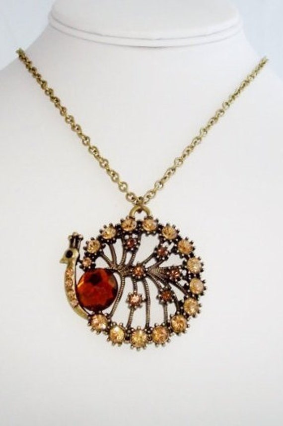 Brass Tone Topaz Crystal Peacock Pendant Necklace - image 1
