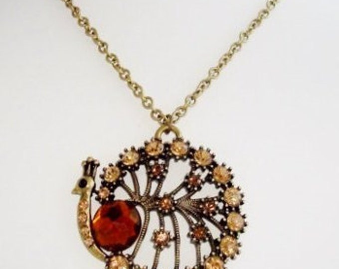 Brass Tone Topaz Crystal Peacock Pendant Necklace