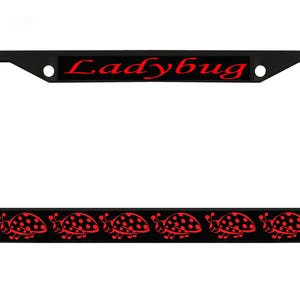 May include: Black license plate frame with the word "Ladybug" in red script across the top. The bottom features a repeating pattern of red ladybug illustrations with black spots.
