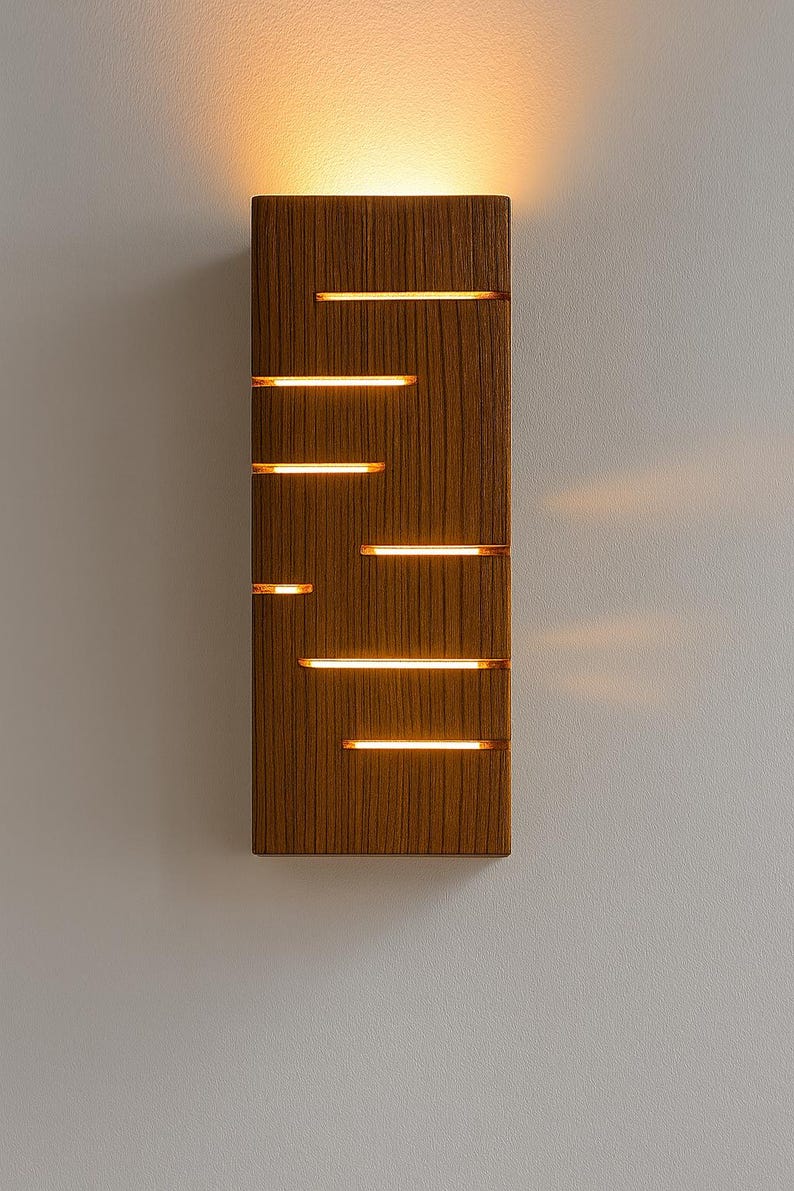 A vertical rectangular wooden wall sconce with warm LED light shining through carved horizontal openings. The wood has a natural grain and rustic brown finish. The style is minimalist, cozy, and modern, suitable for hallway, living room, or bedroom wall lighting.