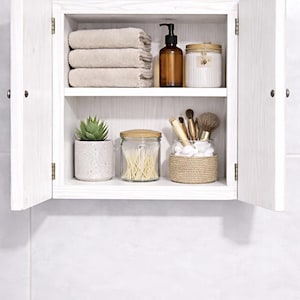 Wall mounted solid wood bathroom cabinet with marine plywood doors and interior shelves for toiletries in modern farmhouse bathroom