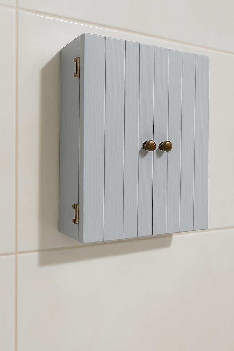 Wall mounted solid wood bathroom cabinet with marine plywood doors and interior shelves for toiletries in modern farmhouse bathroom