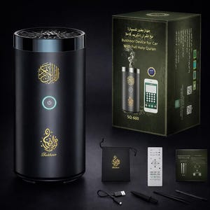 May include: Black Bukhoor device with gold Arabic calligraphy and a power button. The box reads "Bukhoor Device for Car With Full Holy Quran". Accessories include a remote, USB cable, and a small pouch. The model number is SQ-600.
