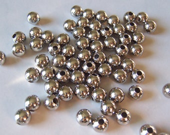 Package of 50 8mm Round Hollow Light Weight Silvertone Beads