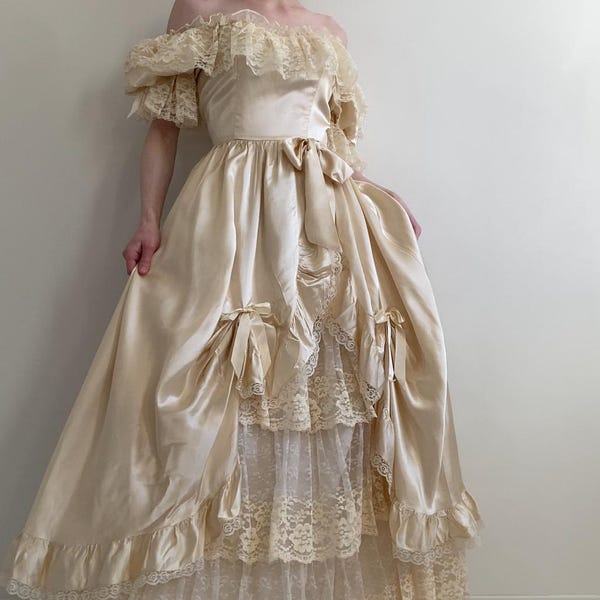 1980s Victorian Inspired Vintage Wedding Gown with Ruffles, Lace, and Bows