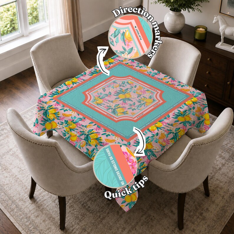 May include: A square tablecloth with a pink floral pattern featuring lemons and flowers. The tablecloth has a turquoise border and is set on a table with four chairs. The words "Quick tips" and "Direction markers" are visible.