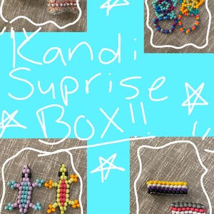 May include: An assortment of colorful beaded jewelry and accessories, including bracelets, star-shaped ornaments, and lizard figures. The image features the text "Kandi Suprise Box!!" in white, handwritten-style lettering against a blue background.