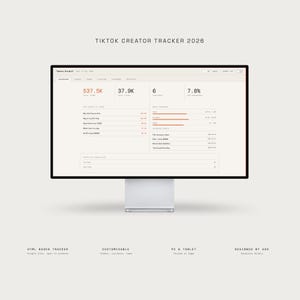 May include: A computer monitor displaying a TikTok Creator Tracker 2026 interface. The screen shows data including 537.5K views, 37.9K followers, 6 published, and 7.8% engagement. The monitor is on a white stand, with text at the bottom.
