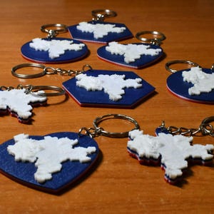 Lot de 12 porte-clés carte en relief