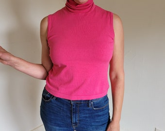 hot pink sleeveless turtleneck