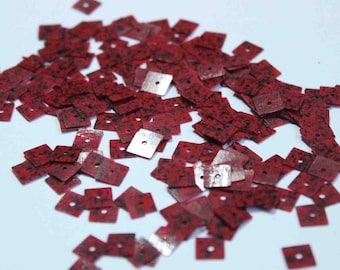 100 lantejoulas texturizadas vermelhas e pretas/KBSS253