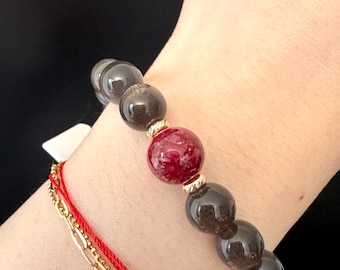 Black Golden Skeletal Sunstone Bracelet with Cinnabar Bead – Unisex Gemstone Jewelry