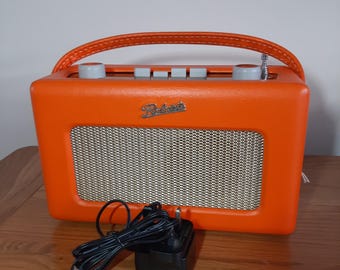 Roberts R250 Revival Radio in Orange - fully working in nice condition.  With power supply included.  FM/MW/LW Retro style in nice colour