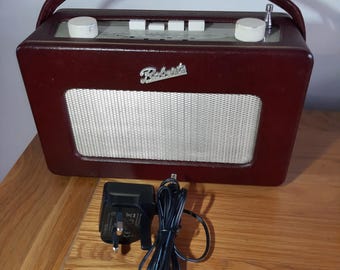 Roberts R250 Revival Radio in Burgundy - fully working in nice condition.  With power supply included.  FM/MW/LW Retro style in nice colour