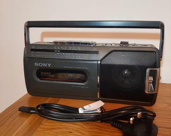 Sony CFM-140L II Radio Cassette Player with new power lead.  New drive belts fitted. Fully working in very nice condition. Battery / Mains.