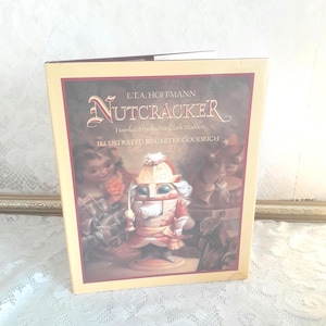 Vintage Christmas book, book Nutcracker ETA Hoffmann 1987 Carter Goodrich, children’s holiday story hardcover, classic Christmas tale