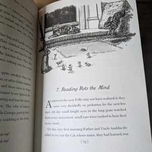 May include: An open book page featuring a black and white illustration of a cat on a porch, a rabbit leaping, and several mice in the grass. The text heading reads 7. Reading Rots the Mind, followed by a paragraph starting with the letter A.