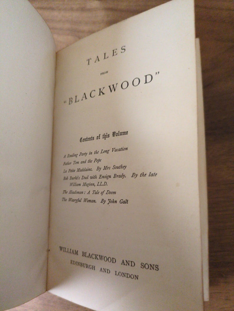 May include: The title page of a book titled Tales from Blackwood, featuring a list of contents including A Reading Party in the Long Vacation, Father Tom and the Pope, La Petite Madelaine, Bob Burke's Duel, The Headsman, and The Wearyful Woman.
