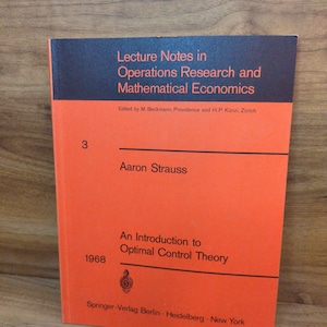 May include: A softcover book titled Lecture Notes in Operations Research and Mathematical Economics, volume 3, by Aaron Strauss, published in 1968. The cover is bright orange with a dark blue top section, black text, and a small black logo.