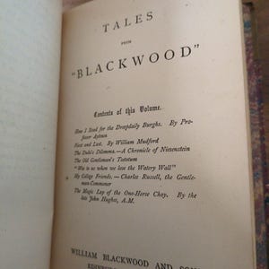 May include: The title page of a book titled Tales from Blackwood, featuring a list of contents including How I Stood for the Dreepdaily Burghs, First and Last, The Duke's Dilemma, The Old Gentleman's Teetotum, and William Blackwood and Sons Edinburgh and London.