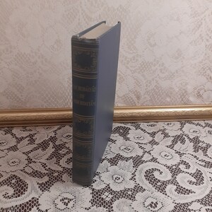 classic poetry book, Rubaiyat Omar Khayyam, Edward Fitzgerald, vintage hardcover, timeless verses, classic literature