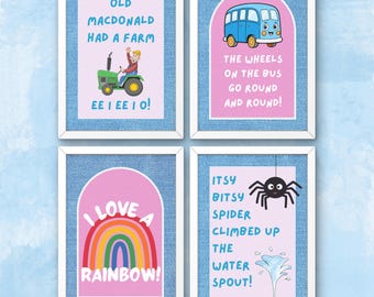 May include: Four printable nursery rhyme posters with white frames. The posters have a pink background with blue text and illustrations. The rhymes are "Old MacDonald Had a Farm", "The Wheels on the Bus Go Round and Round", "I Love a Rainbow", and "Itsy Bitsy Spider Climbed Up the Water Spout!"
