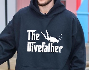 May include: A black hoodie with a white graphic of a scuba diver and the text "The Divefather".