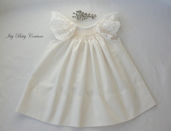 white smocked baby dress
