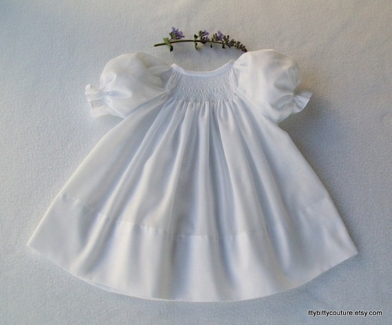 white smocked baby dress