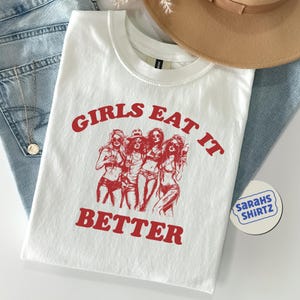 Girls Eat It Better Funny Y2K Baby Tee, LGBTQ Pride Top, Pride Month Tshirt, Lesbian Bisexual Retro Pride T-Shirt, Funny WLW Pink T-shirt