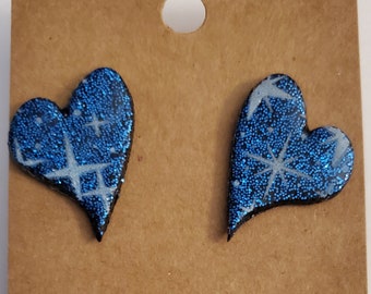 Blue glitter heart earrings with stars. Handmade polymer clay with hypoallergenic posts.