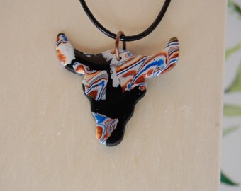 Black multicolor bull western necklace with copper accents. Handmade with polymer clay.