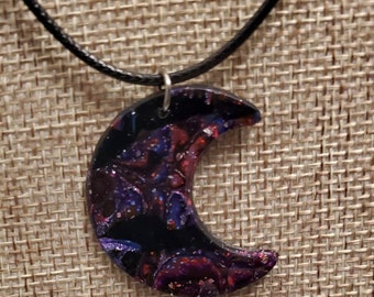 Moon black, purple metallic and red stripes. Handmade polymer clay necklace is reversable.