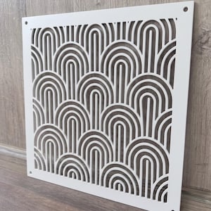 May include: A square white metal vent cover featuring a repeating laser-cut pattern of nested arches. The design consists of multiple concentric semi-circular lines arranged in a grid, with small circular mounting holes in each of the four corners.