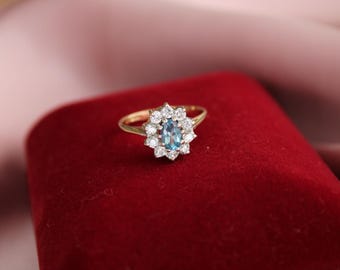 Aquamarine and Diamond cluster ring