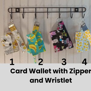 Mini carteira para cartão com bolso com zíper e alça de pulso